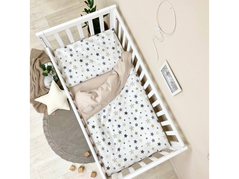 Changeable set in a baby bed Stars beige