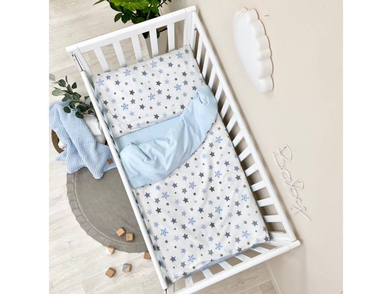 Changeable set in a baby bed Stars blue